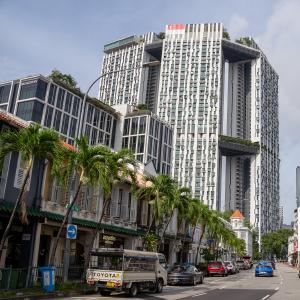 Neil Road historical shophouses on the left with the Pinnacle@Duxton residential complex in the background.